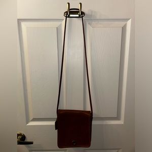 Coach Vintage leather handbag. Metal twist closure.